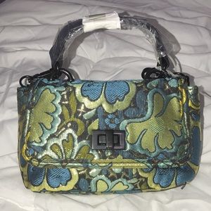 STEVE MADDEN small super stylish flower fabric bag.